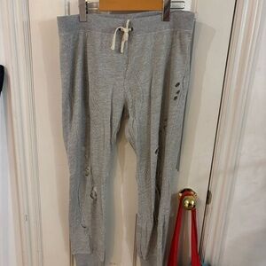 Pam & Gela gray sweatpants - holes are part of the sweatpants